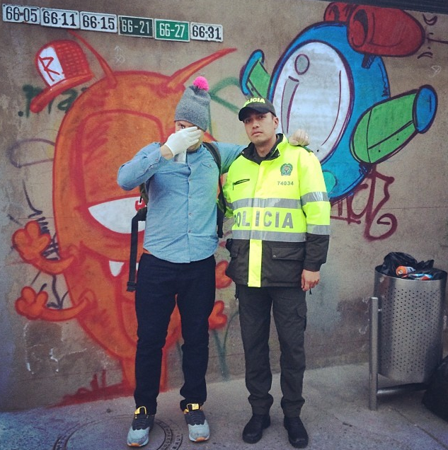 Ronzo & a police officer in Bogotà. Pic via his Instagram.